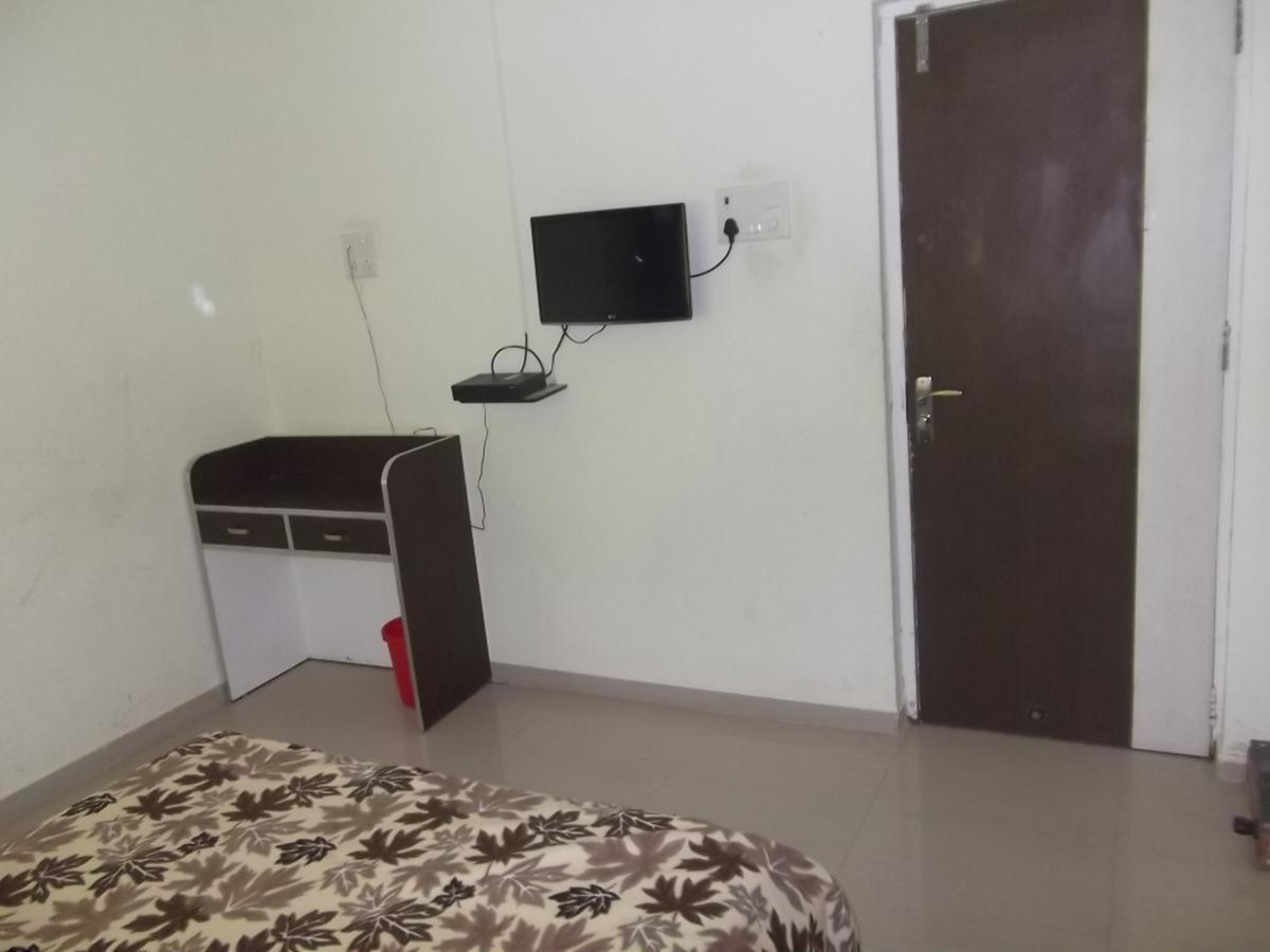 Hotel Rajyog Ranjangaon Ganpati Quarto foto